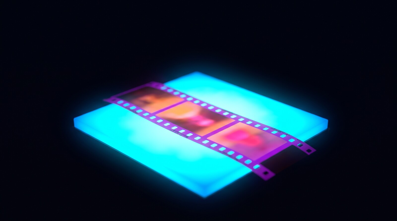 A negative strip glowing on an even backlight
